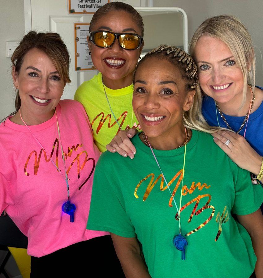The four founding members of Mom Bop in bright Mom Bop t-shirts
